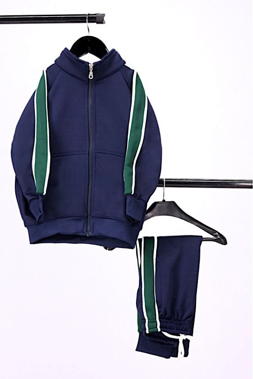 Front view Boys Navy Tracksuits with green strips hanging on hanger with white background