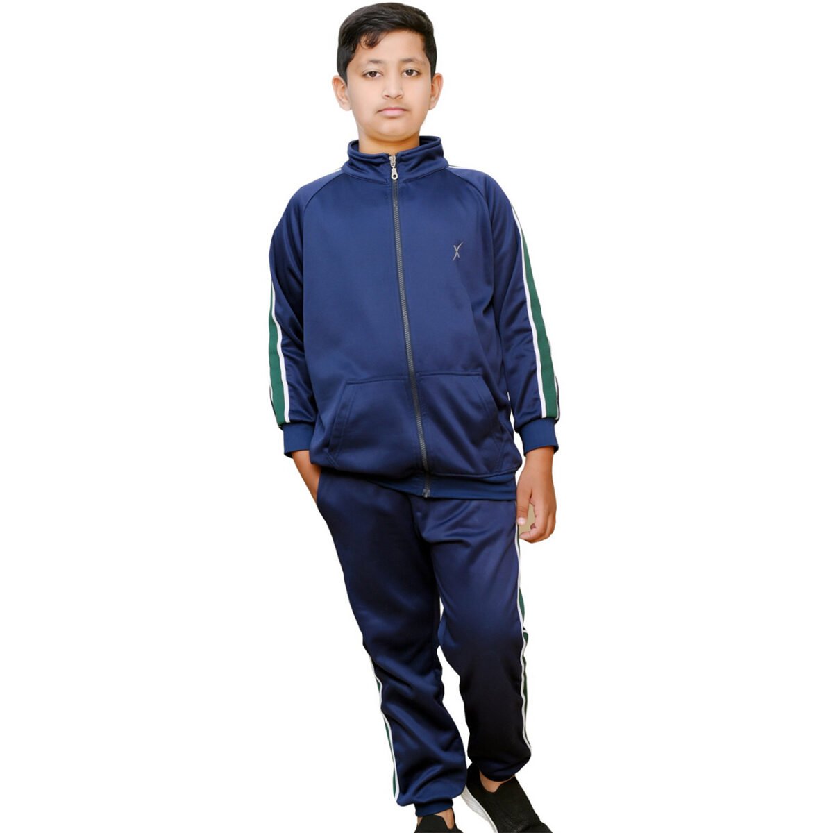asian pakistani desi boy standing with wearing polyester navy colour tracksuit made by xtremesportwear with white background